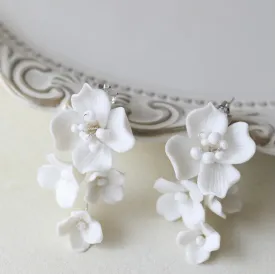 E188. bridal earrings, made with clay flowers.
