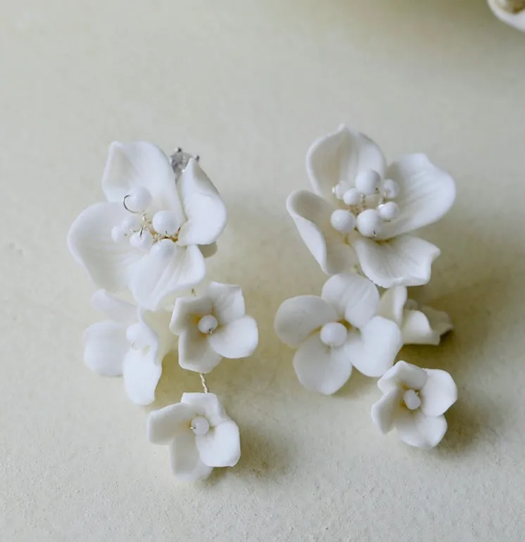 E188. bridal earrings, made with clay flowers.