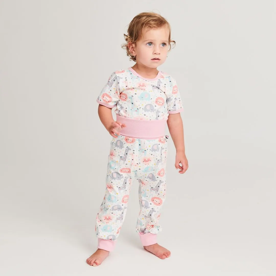 Organic rib pants "Mini Jungle Rose" made from 95% organic cotton and 5% elasthane