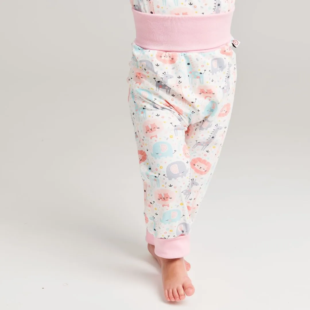 Organic rib pants "Mini Jungle Rose" made from 95% organic cotton and 5% elasthane